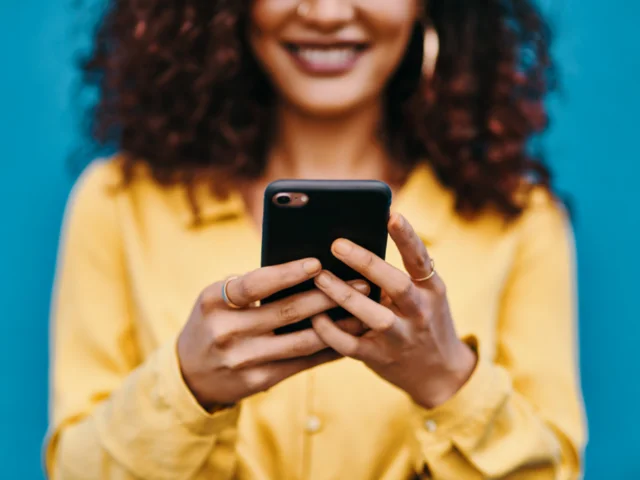 Woman Smiling at phone